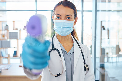Buy stock photo Covid compliance, medical doctor and woman with face mask and thermometer check for safety and protection before entry in a hospital. Portrait of healthcare worker treating coronavirus