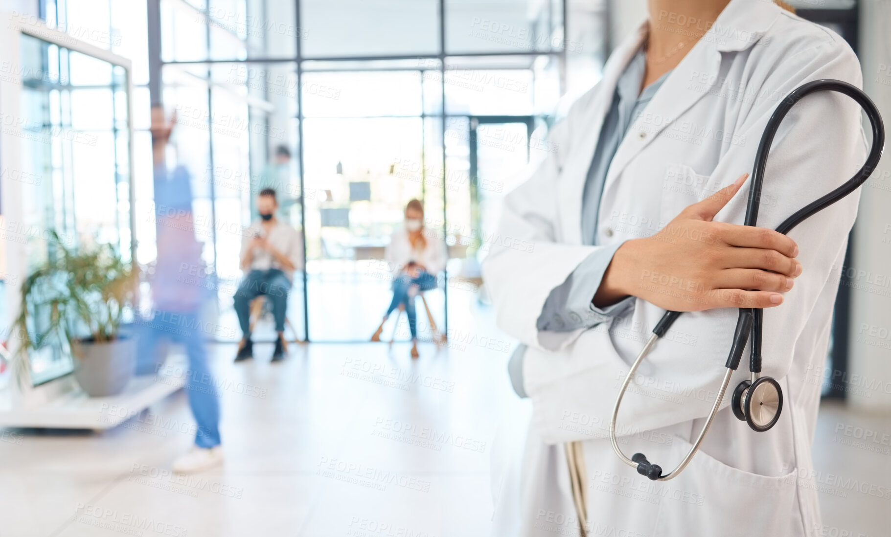 Buy stock photo Medical healthcare doctor, woman worker or employee arms crossed confident with stethoscope in busy hospital. Leadership, work or wellness female staff manager nurse working in medicine clinic office