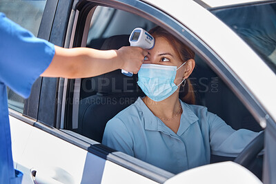 Buy stock photo Car, drive thru covid test and thermometer with nurse and patient. Young woman in vehicle, wearing a mask and medical care worker doing fever screening. Masks, coronavirus and testing on site