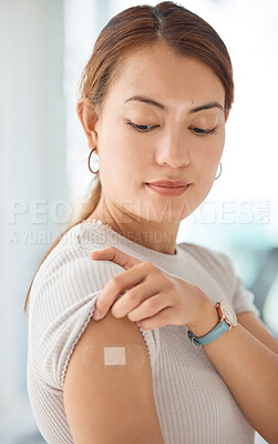 Buy stock photo Healthcare, covid and vaccine with woman and bandaid on arm for medical, patient and wellness against virus. Medicine, support and health with girl after vaccination for sick, flu or illness 