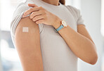 Covid, vaccine and woman with plaster on arm, medical shoulder injection dose and immunization bandage. Corona virus immunity, immune system cure or wellness and female patient healthcare vaccination