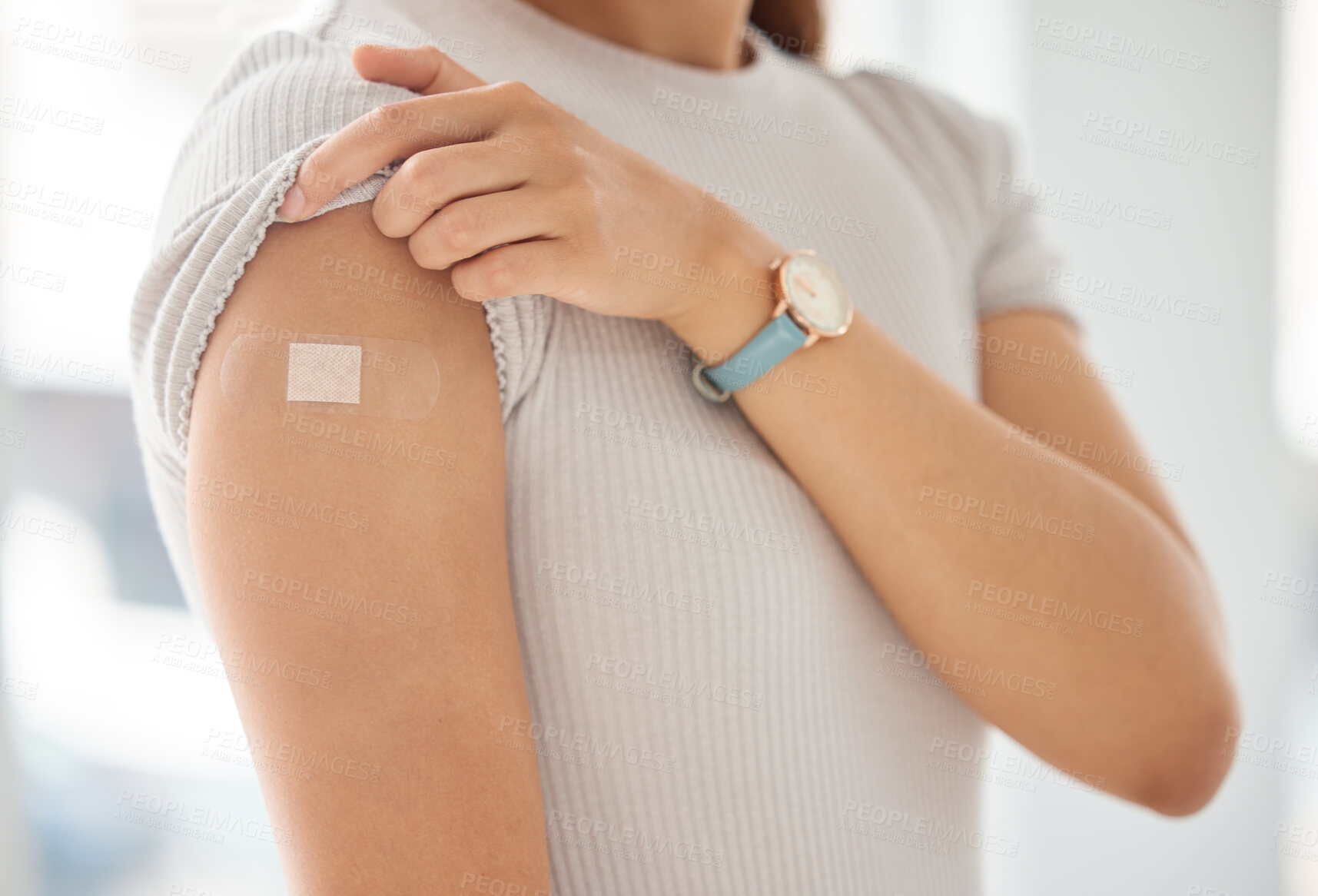 Buy stock photo Covid, vaccine and woman with plaster on arm, medical shoulder injection dose and immunization bandage. Corona virus immunity, immune system cure or wellness and female patient healthcare vaccination