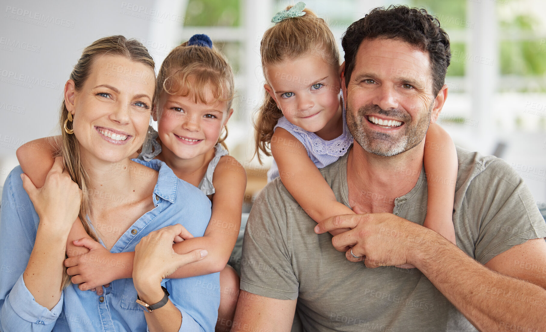 Buy stock photo Happy, smile and portrait of relax family on home living room sofa bonding, having fun and enjoy quality time together. Happiness, love and happy family youth kids or children hug mother and father