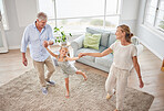 Family or grandparents dancing with child in living room for wellness, healthy body movement and growth development in retirement lifestyle. Happy energy, grandmother and grandfather dance with kid