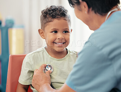 Buy stock photo Children, healthcare and stethoscope with a doctor or pediatrician listening to the heartbeat of a boy patient in the hospital. Nurse, medical and trust with a male child and female consultant
