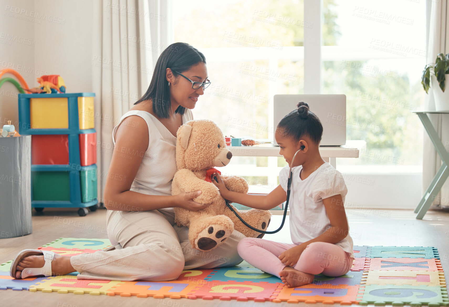 Buy stock photo Kindergarten, education and stethoscope with teacher and girl playing doctor game with teddy bear for development, learning and care. Classroom, wellness and therapist with young student and woman 