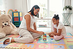 Teaching game, building toys and mother with girl in kid bedroom for growth, knowledge and problem solving. Mom, child or black people together on a floor for mental thinking development and learning