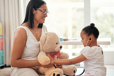 Buy stock photo Teddy bear doctor, girl game and mother with smile for child, happy medical work and family love for healthcare in home. Girl and mom giving support and help playing nurse to toys in house together