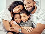 Man, woman and children in family portrait hug and bonding on house living room sofa or home interior furniture. Happy smile, love couple or mother and father with kids in trust, security and support