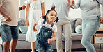 Happy girl with family dancing in living room while playing, having fun and enjoy bonding quality time together. Happy family love, connection and freedom for youth child or kid at home dance party