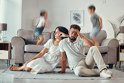Buy stock photo Stress, tired and parents with adhd kids playing on couch making mom sad, exhausted and frustrated with dad. Headache, mother and overwhelmed father with loud children jumping on sofa in family home