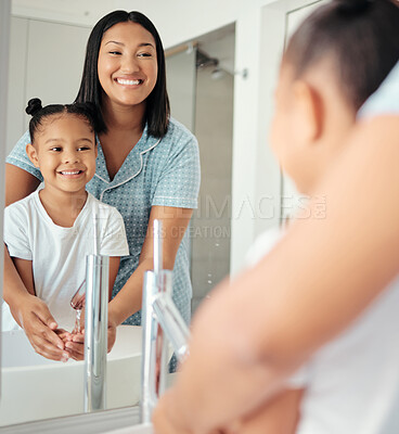 Buy stock photo Mom teaching kid washing hands, cleaning and water for healthy hygiene, wellness safety and morning lifestyle. Mother, girl child and learning bathroom mirror skincare for covid bacteria protection