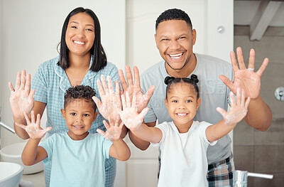 Buy stock photo Parents, children and cleaning hands as a happy family in a bathroom together at home with a proud mother and father. Smile, dad and healthy mom enjoys a wellness and cleanliness lifestyle with kids