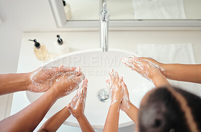 Buy stock photo Family washing hands with soap foam, water and bathroom hygiene, cleaning and wellness. Above parents teaching kids healthy skincare, body and morning lifestyle routine for covid bacteria protection