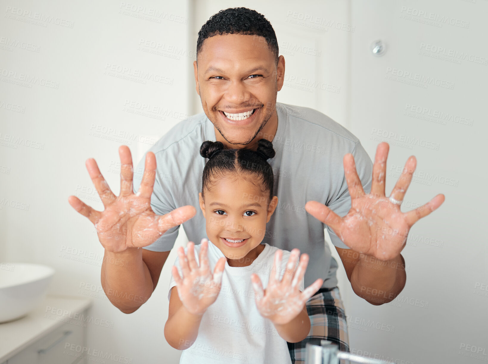 Buy stock photo Black family with soap on hands in bathroom for bacteria cleaning safety, learning or teaching hygiene healthcare portrait. Wellness father showing girl child how to wash germs with foam for skincare