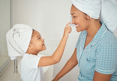 Buy stock photo Mother, face cream and girl child in bathroom apply beauty, cosmetics and lotion product for shower morning routine. Happiness, smile or happy mom and young kid love skincare creme, bonding at home