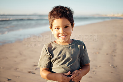 Buy stock photo Beach, relax and travel child portrait with smile on sand for peaceful summer break in Mexico. Young and happy boy on Mexican ocean vacation enjoying freedom and leisure with seaside walk.

