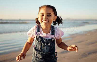 Buy stock photo Energy, freedom and black girl running at beach, happy and excited about view of the ocean at sunset. Sea, travel and summer fun by child enjoying fresh air on a seaside getaway playing and laughing
