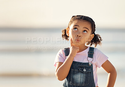 Buy stock photo Planning, idea and thinking child on beach for summer holiday by water, sea or ocean in travel location of Mexico. Face of youth, kids and girl planning fun, play and freedom game activity in nature