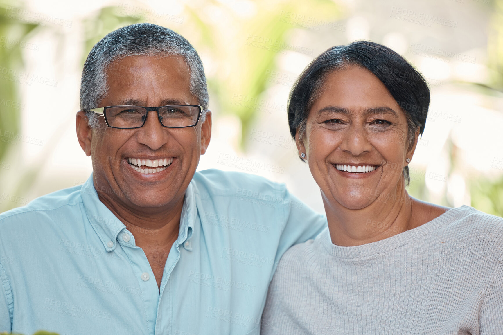 Buy stock photo Smile, happy or bonding mature couple in house or home garden in trust, security and love marriage. Portrait of retirement, elderly or senior man and woman sitting together and laughing at funny joke