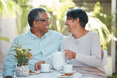 Buy stock photo Mature couple laughing, drinking tea and bonding in backyard together, relax and cheerful outdoors. Senior man and woman enjoying retirement and their relationship,sharing a joke and tea time snack