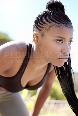 Buy stock photo Motivation, focus and fitness black woman about to run a sport workout outdoor. Sports training, health exercise and athlete with a serious face expression about to start a strong cardio session