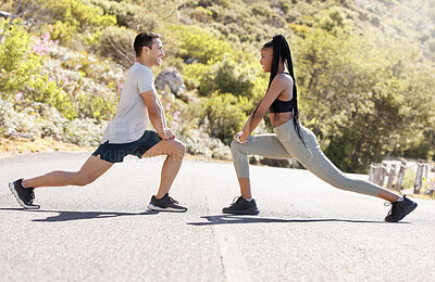 Buy stock photo Training, fitness and interracial couple in nature on a road doing a outdoor workout stretch. Motivation, health and sport partners or friends doing a sports, athlete and cardio exercise together