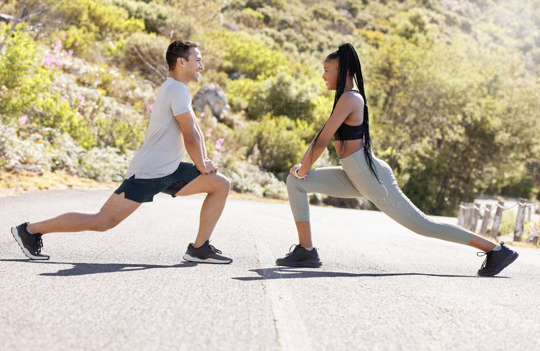 Buy stock photo Training, fitness and interracial couple in nature on a road doing a outdoor workout stretch. Motivation, health and sport partners or friends doing a sports, athlete and cardio exercise together