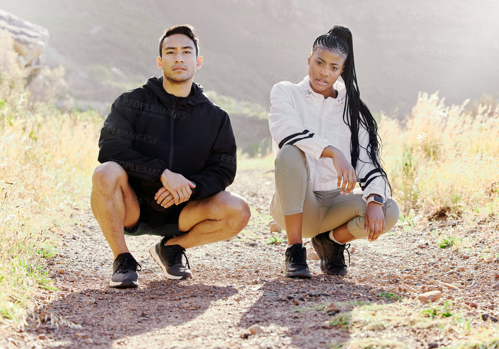 Buy stock photo Interracial couple, fitness and nature in sports motivation and fashion for healthy outdoor exercise or workout. Portrait of fit confident asian man and black woman ready on hiking trail outdoors