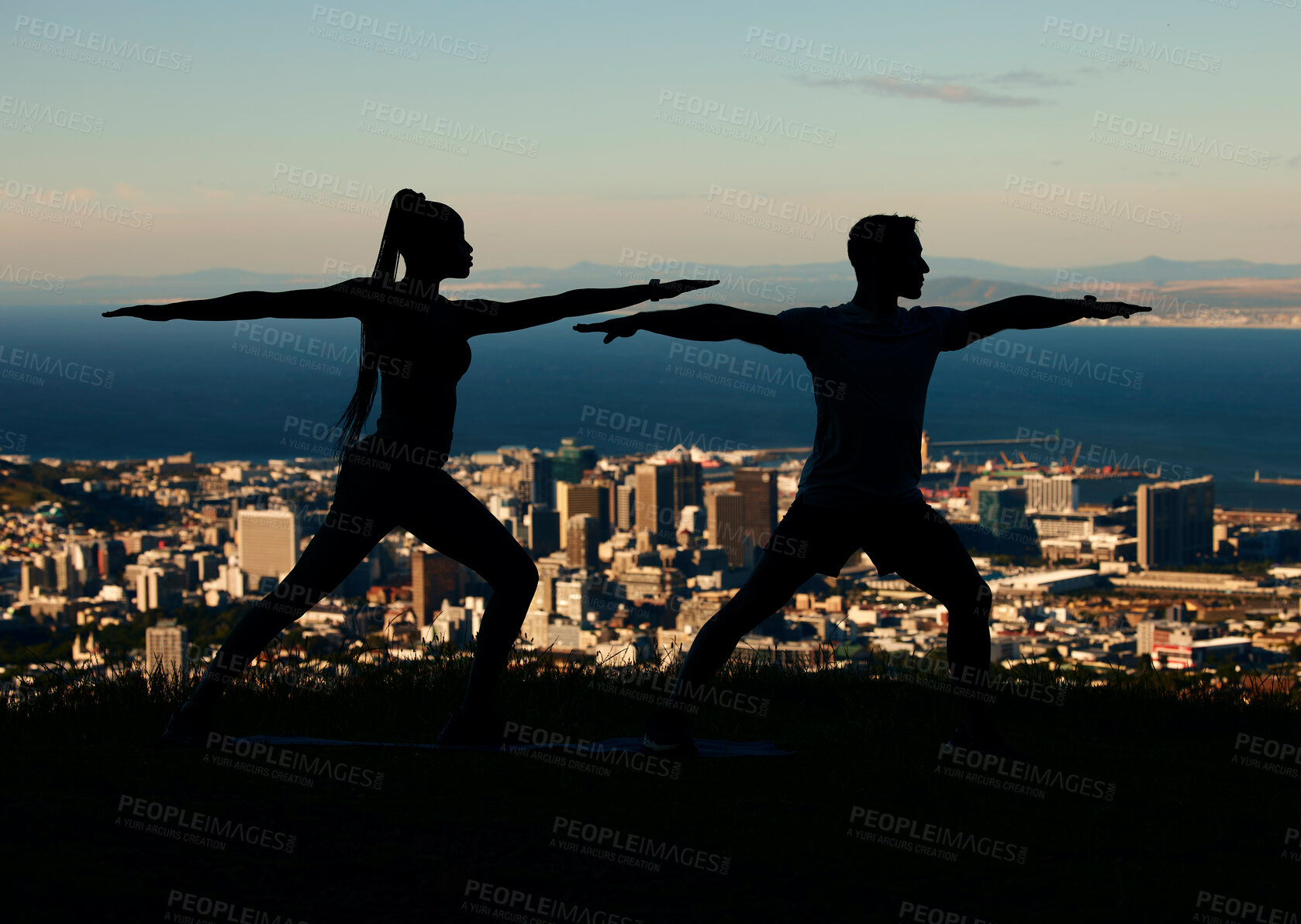 Buy stock photo Yoga, silhouette and city with a couple outdoor for exercise, workout and training. Health, wellness and fitness with a man and woman exercising outside together on an urban background in the evening