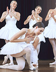 Ballet, dance and art with a woman ballerina or dancer dancing on a theater stage during a performance, recital or rehearsal. Creative, artist and performer with a female training for a showcase