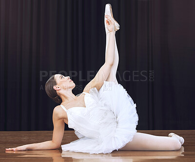 Buy stock photo Ballet, theatre and dancer in a stage performance showing balance, flexibility and elegant movement. Creative, concert and young woman is an artistic ballerina dancing in a classy and feminine style