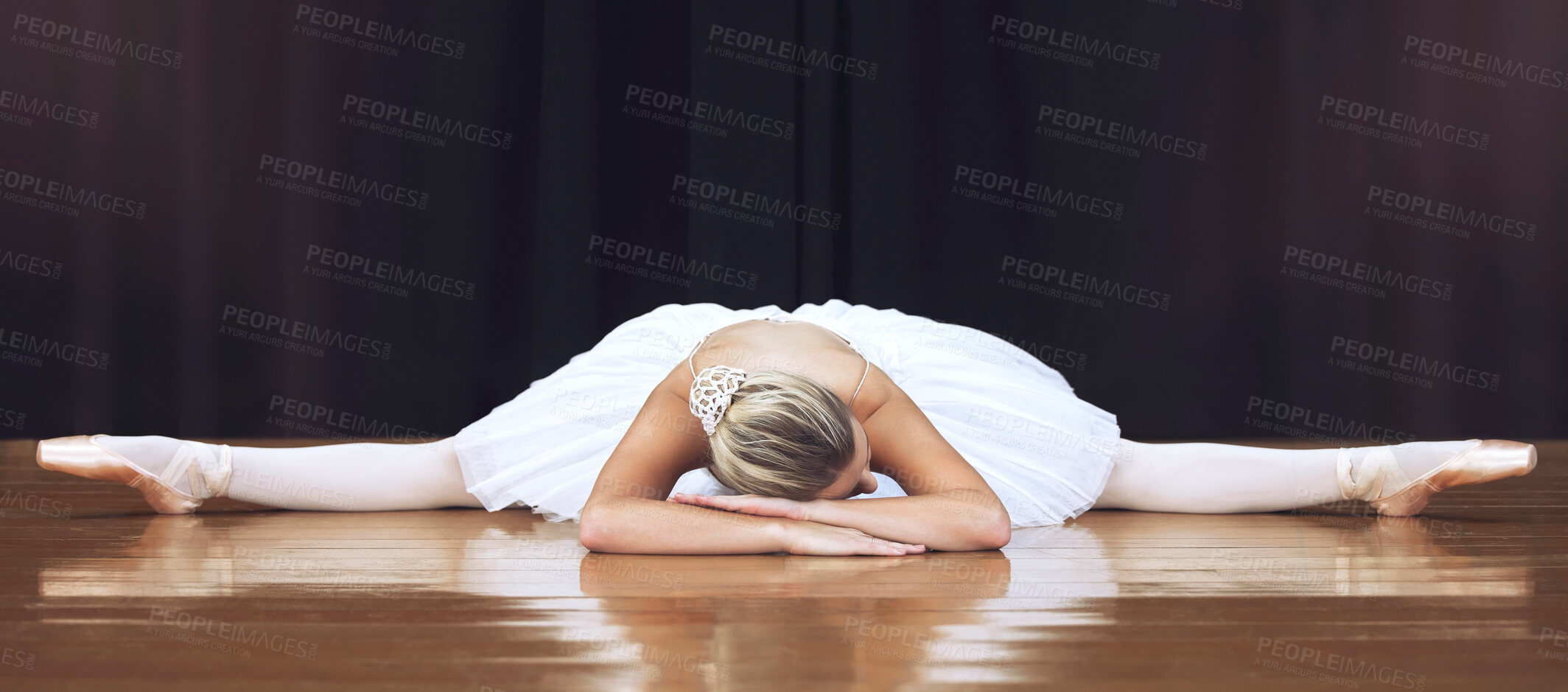 Buy stock photo Ballet, stage and dance with woman stretching in split training and getting ready for theatre, performance or show. Creative, motivation and art with ballerina dancer in studio dancing for recital