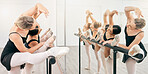 Ballet class, mirror and dance school with women during training, practice and exercise in studio. Ballerina girl dancers dancing for fitness, rehearsal and art performance for flexibility in lesson
