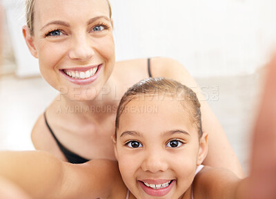 Buy stock photo Ballet teacher, little girl and selfie with woman and happy young student in studio. Dance, art and child development in creative arts. Support, learning and diversity in fun dance class for children