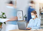 Covid, office and planning or focused woman on laptop with mask for protection in workplace. Motion blur of business people in fast paced workplace with coronavirus precautions and safety mask.