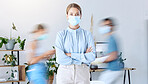 Business woman with his arms crossed and covid mask for safety at work in a busy office. Portrait of female manager with facial cover protection from a virus and covid 19 for healthcare and wellness