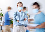 Portrait of business woman in busy office and a blur of people around her. Business people in the office during covid, wearing face masks and working in fast pace company. Female leader in workplace