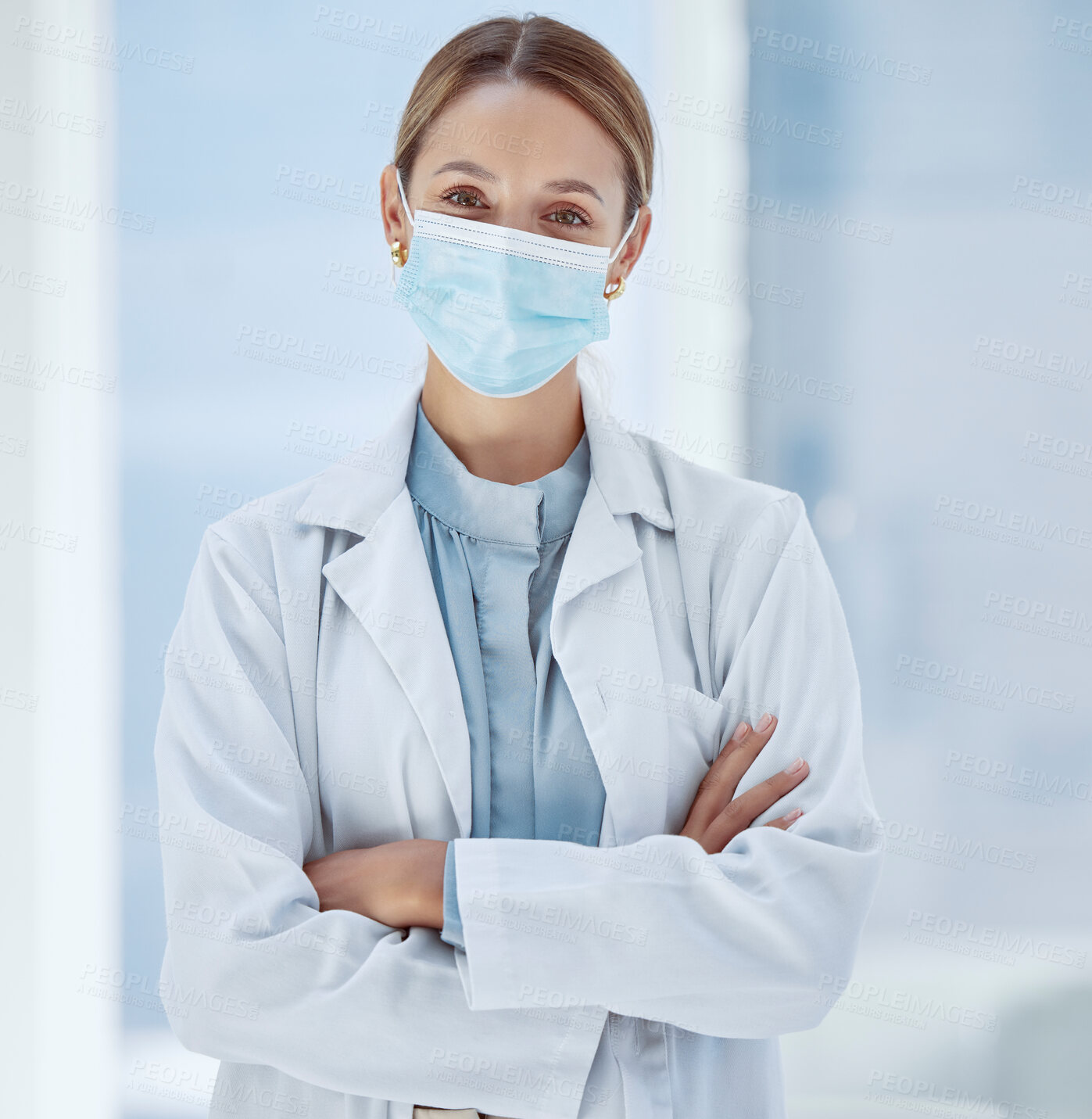 Buy stock photo Woman, healthcare and covid face, mask rules with proud doctor working in a hospital, ready and confident. Health care professional leader work during pandemic, focused on helping sick people