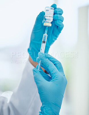 Buy stock photo Covid, medicine and vaccine with hands of doctor holding syringe and glass vial for healthcare, pharmacy and science. Innovation, medical and research with pharmacist working on treatment for virus
