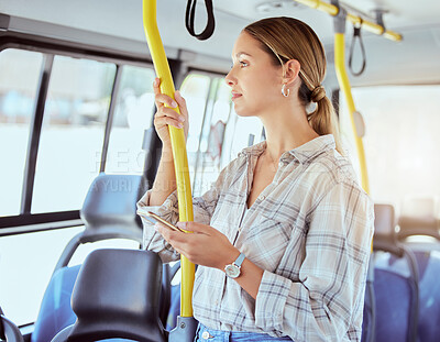 Buy stock photo Woman travel with smartphone on bus transportation check social media, website or internet for information about the city. Young person with 5g cellphone on public transport in urban town lens flare