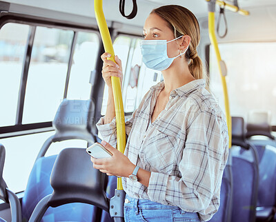Buy stock photo Covid, face mask and public transport with woman in a bus or train on commute into city or work during coronavirus pandemic. Travel, precaution and safety of commuter or passenger female traveling