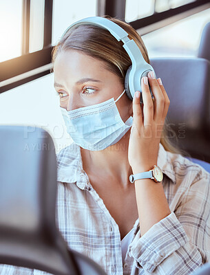 Buy stock photo Covid, face mask or headphones on woman in bus for city travel, public transport or location commute. Thinking, fashion or relax student in virus compliance listening to podcast, radio or music audio