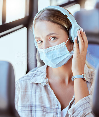 Buy stock photo Bus travel, covid woman and headphones for music, podcast or radio in urban journey, transport and trip. Portrait of young girl listening to audio, face mask rules and corona virus safety on train