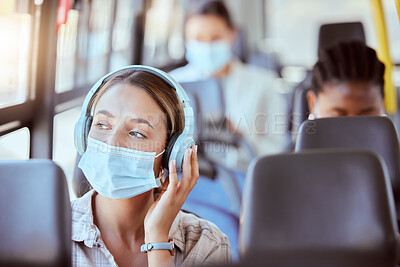Buy stock photo Covid, bus and woman with face mask and headphones listening to podcast on safety compliance, freedom or health risk. Girl city travel or transportation and music for corona virus radio news update 