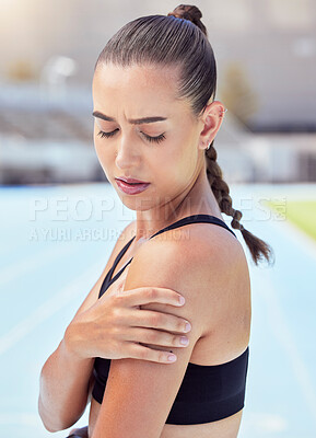 Buy stock photo Woman athlete hands shoulder pain, emergency health risk and muscle strain during workout, training and exercise. Closeup of female runner touching pulled muscle, arm injury and sore outside on track