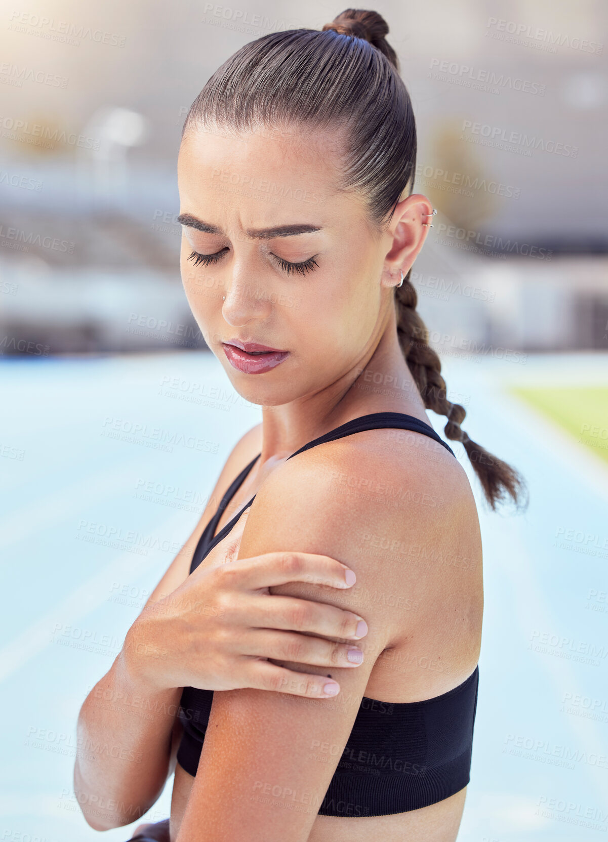 Buy stock photo Woman athlete hands shoulder pain, emergency health risk and muscle strain during workout, training and exercise. Closeup of female runner touching pulled muscle, arm injury and sore outside on track