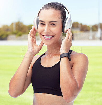 Buy stock photo Exercise, podcast and radio with woman listen to music while exercising at a park, happy and relax. Fitness, health and portrait of a girl enjoy motivation and wellness tips, audiobook and workout