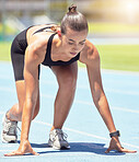 Runner, woman and focus of a athlete about to start a run on a sport track outdoor. Fitness, sports and motivation for workout training for running in a exercise for healthy living and strong cardio 