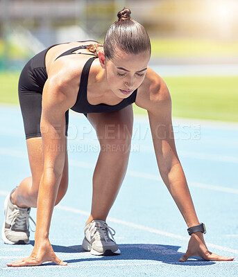Buy stock photo Runner, woman and focus of a athlete about to start a run on a sport track outdoor. Fitness, sports and motivation for workout training for running in a exercise for healthy living and strong cardio 